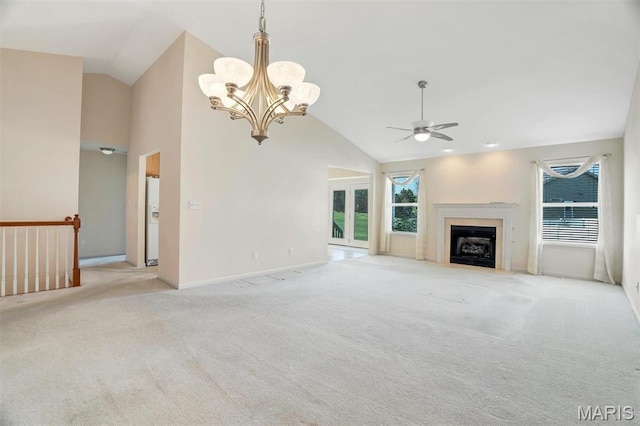 4817 Misty Wood Ct, Wentzville, MO 63385 - unfurnished living room featuring ceiling fan, carpet, high vaulted ceiling, a chandelier, and a fireplace