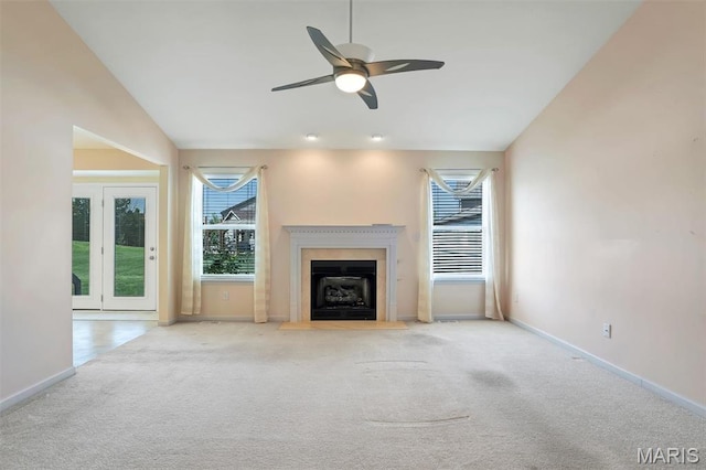 4817 Misty Wood Ct, Wentzville, MO 63385 - unfurnished living room with carpet, a fireplace with flush hearth, a ceiling fan, and lofted ceiling