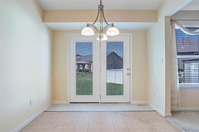 4817 Misty Wood Ct, Wentzville, MO 63385 - entryway featuring a chandelier and light tile patterned floors
