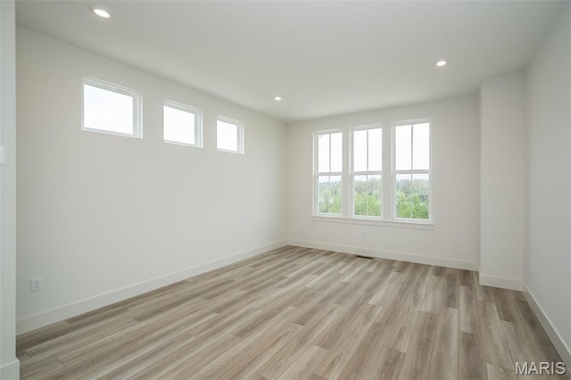 8935 E Gateway Hts Unit 94-808, Richmond Heights, MO 63144 - unfurnished room featuring recessed lighting and light wood-type flooring