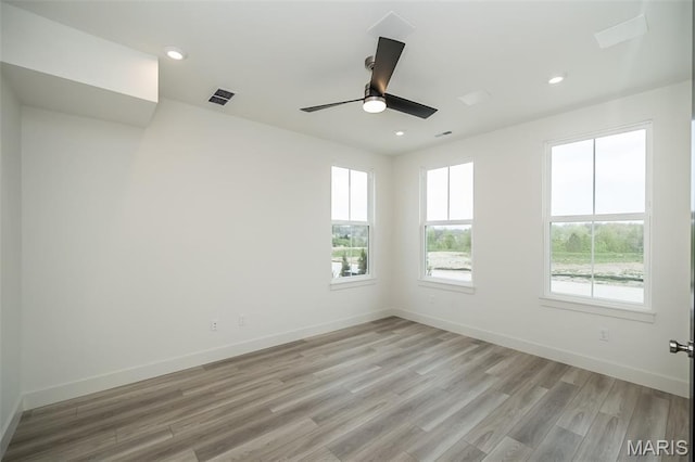 8935 E Gateway Hts Unit 94-808, Richmond Heights, MO 63144 - empty room with light wood finished floors, a ceiling fan, and recessed lighting