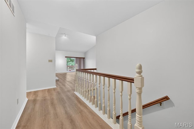 425 Charter Way Dr, Wildwood, MO 63040 - hall with an upstairs landing and wood finished floors
