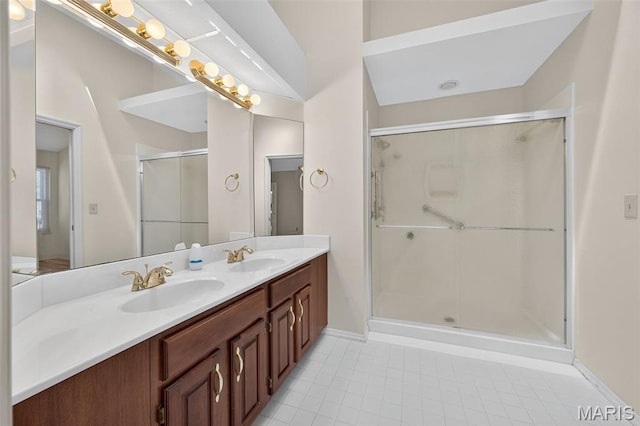 425 Charter Way Dr, Wildwood, MO 63040 - full bathroom featuring double vanity, a stall shower, and tile patterned flooring