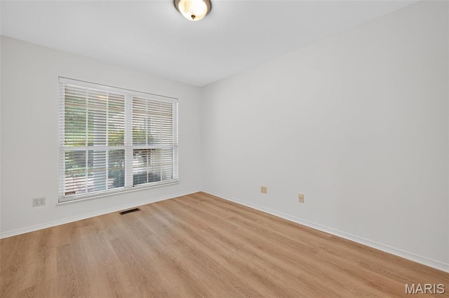 425 Charter Way Dr, Wildwood, MO 63040 - unfurnished room with light wood-style flooring and baseboards