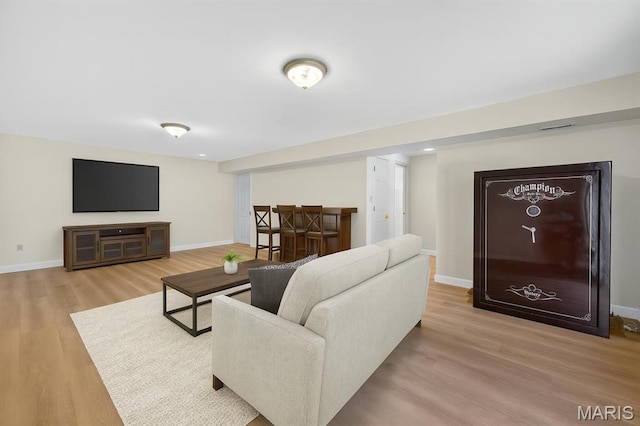 425 Charter Way Dr, Wildwood, MO 63040 - living room featuring wood finished floors and baseboards
