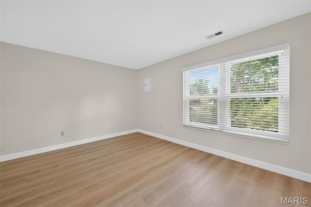 425 Charter Way Dr, Wildwood, MO 63040 - spare room featuring baseboards and light wood-style floors