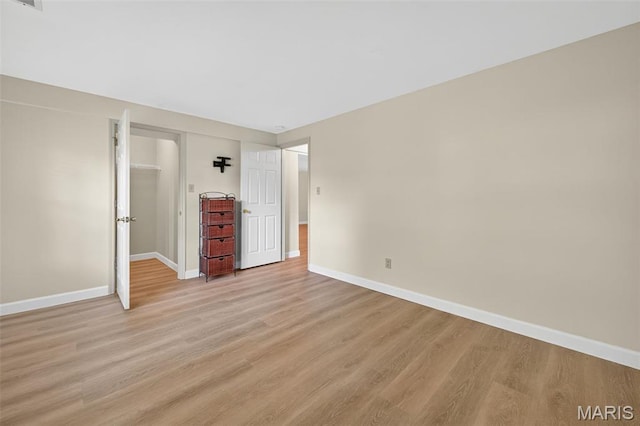 425 Charter Way Dr, Wildwood, MO 63040 - unfurnished bedroom featuring light wood finished floors