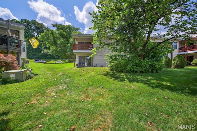 425 Charter Way Dr, Wildwood, MO 63040 - view of green lawn featuring a balcony