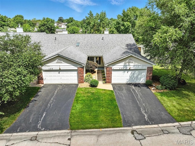 425 Charter Way Dr, Wildwood, MO 63040 - view of front facade featuring driveway, brick siding, and a front lawn