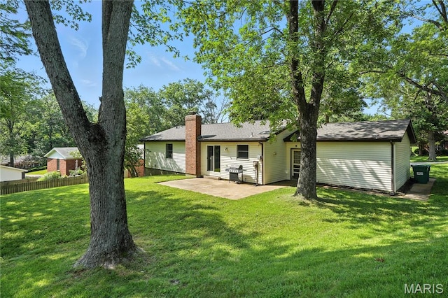20 Hiddenbrook Dr, Black Jack, MO 63033 - rear view of property featuring a chimney and a patio