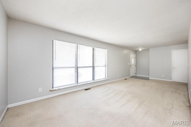 2313 College, Belleville, IL 62221 - spare room with light colored carpet and baseboards