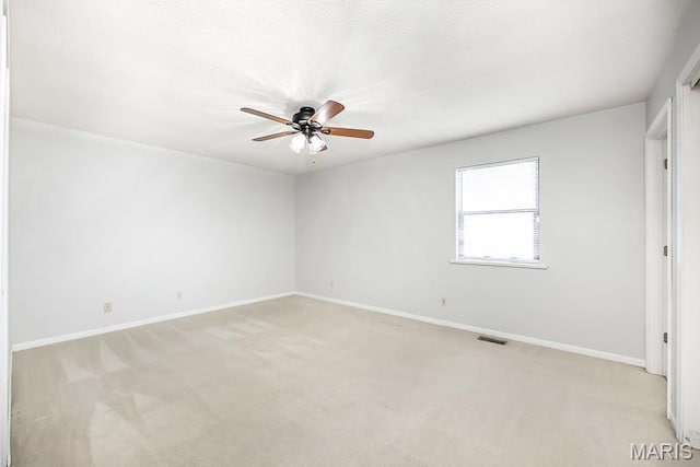 2313 College, Belleville, IL 62221 - unfurnished room with a ceiling fan and light colored carpet
