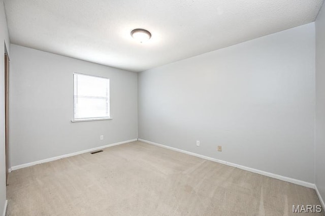 2313 College, Belleville, IL 62221 - unfurnished room featuring light colored carpet
