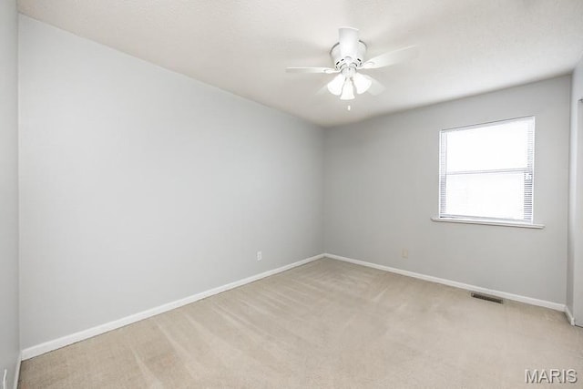 2313 College, Belleville, IL 62221 - unfurnished room featuring a ceiling fan and light carpet