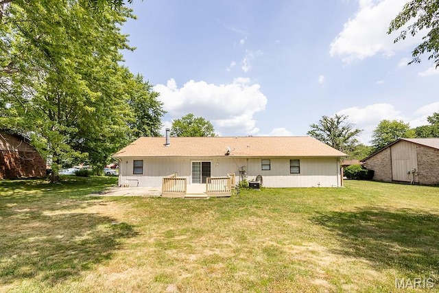 2313 College, Belleville, IL 62221 - rear view of property with a yard and a deck