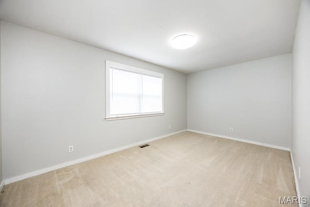 2313 College, Belleville, IL 62221 - empty room with light colored carpet