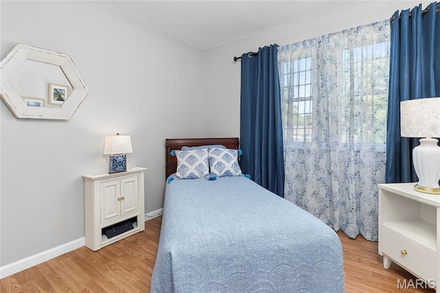 420 Echo Hill Dr, Ballwin, MO 63021 - bedroom with wood finished floors and baseboards