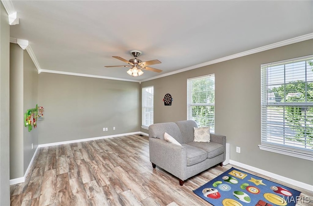 20 Airfield Crossing Court, Lake St Louis, MO 63367 - living area with ornamental molding, wood finished floors, and a ceiling fan