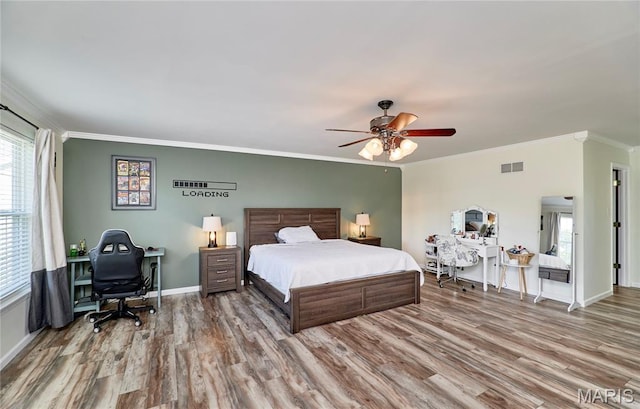 20 Airfield Crossing Court, Lake St Louis, MO 63367 - bedroom with wood finished floors, ornamental molding, multiple windows, and ceiling fan