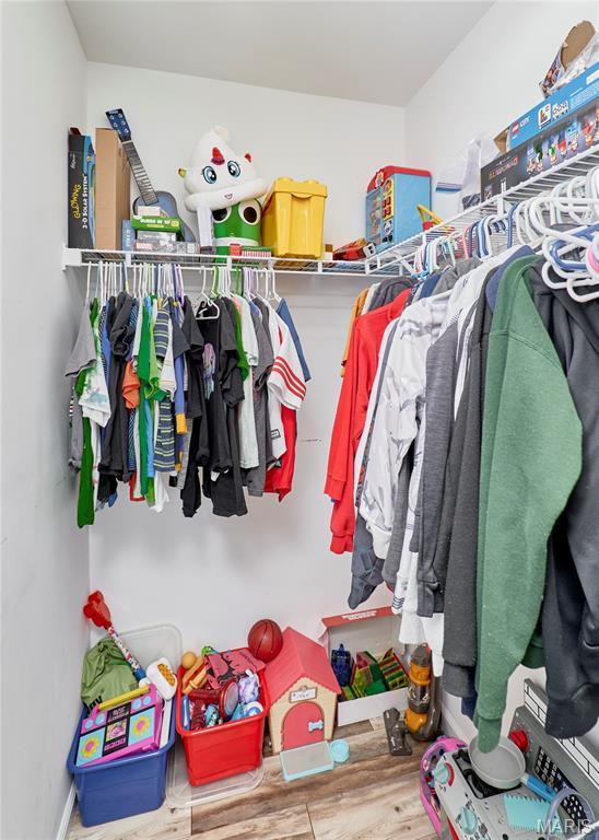 20 Airfield Crossing Court, Lake St Louis, MO 63367 - walk in closet with wood finished floors
