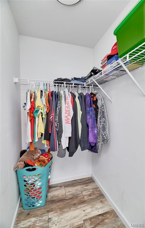 20 Airfield Crossing Court, Lake St Louis, MO 63367 - spacious closet with wood finished floors