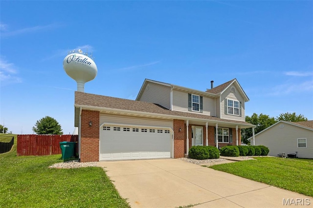922 Benjamin Dr, Ofallon, IL 62269 - traditional-style home with an attached garage, brick siding, driveway, and covered porch