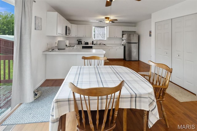922 Benjamin Dr, Ofallon, IL 62269 - dining space featuring dark wood-style floors and a ceiling fan
