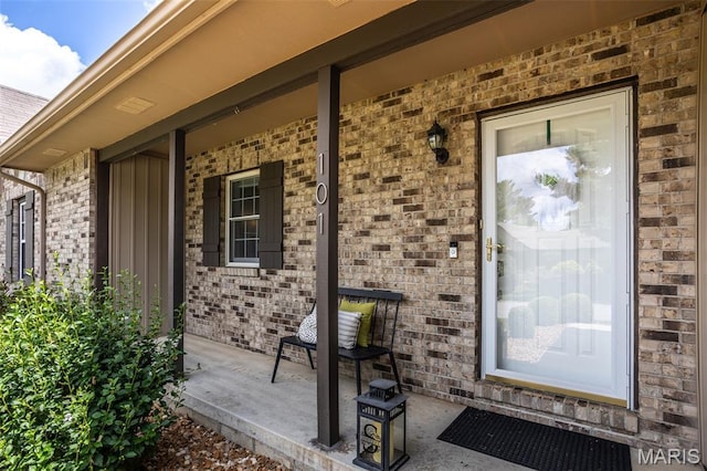 101 Archview Dr, Shiloh, IL 62221 - doorway to property with covered porch and brick siding