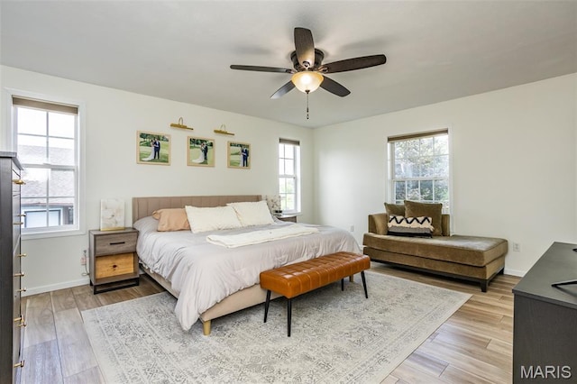 101 Archview Dr, Shiloh, IL 62221 - bedroom featuring multiple windows, light wood-style flooring, and ceiling fan