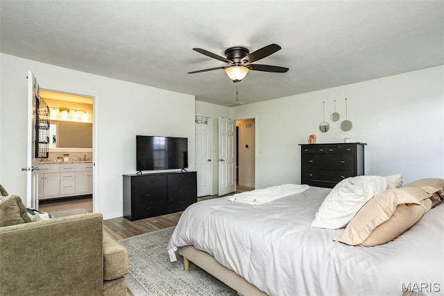101 Archview Dr, Shiloh, IL 62221 - bedroom featuring light wood finished floors, ensuite bath, and ceiling fan
