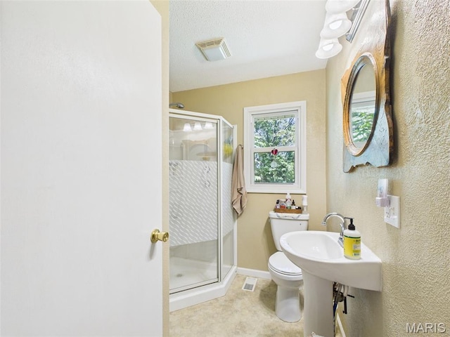 7603 Blue Moon Rd, Bucyrus, MO 65444 - bathroom with a shower stall and a textured wall