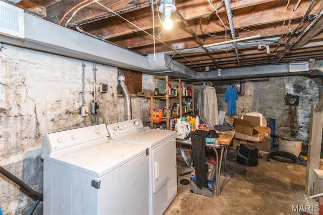 9705 Riverview Dr, Saint Louis, MO 63137 - unfinished below grade area with washer and clothes dryer