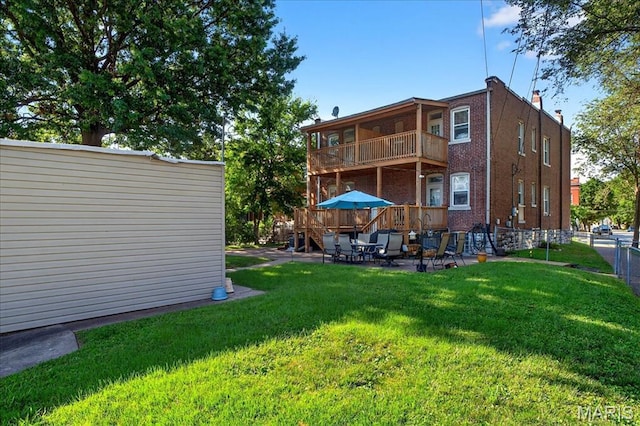 2057-2059 Ann Ave, Saint Louis, MO 63104 - rear view of property with a balcony and a patio