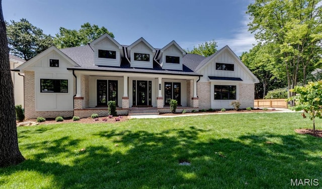 224 Oak Tree Dr, Webster Groves, MO 63119 - modern farmhouse with brick siding, a porch, board and batten siding, and roof with shingles