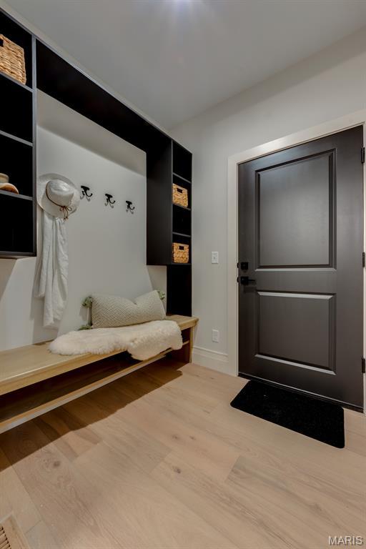 224 Oak Tree Dr, Webster Groves, MO 63119 - mudroom with wood finished floors and baseboards