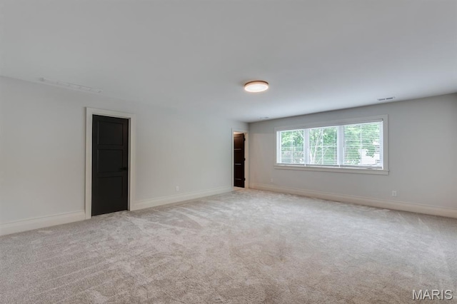 224 Oak Tree Dr, Webster Groves, MO 63119 - empty room with carpet flooring and baseboards