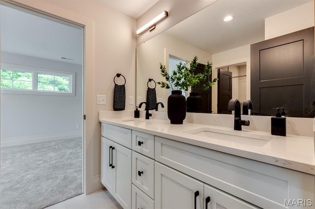 224 Oak Tree Dr, Webster Groves, MO 63119 - full bathroom featuring double vanity and recessed lighting