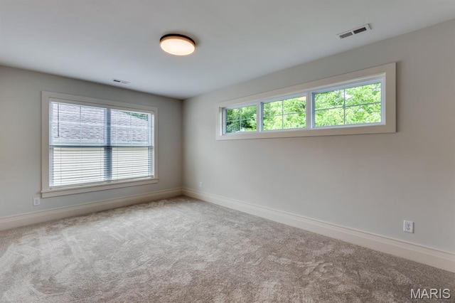 224 Oak Tree Dr, Webster Groves, MO 63119 - carpeted spare room featuring baseboards