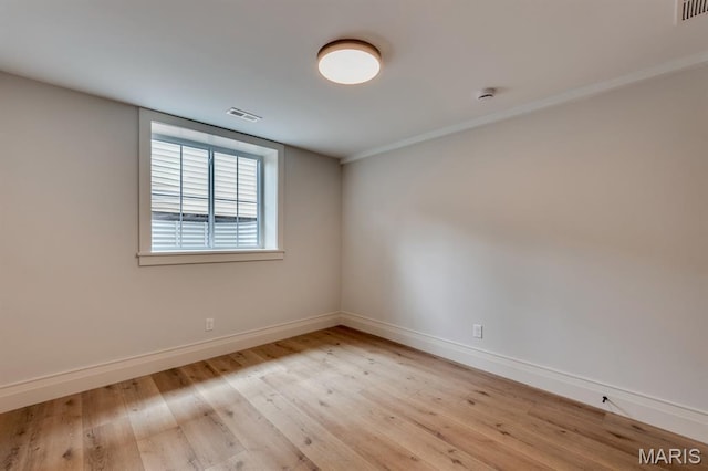 224 Oak Tree Dr, Webster Groves, MO 63119 - empty room featuring light wood-style flooring and baseboards