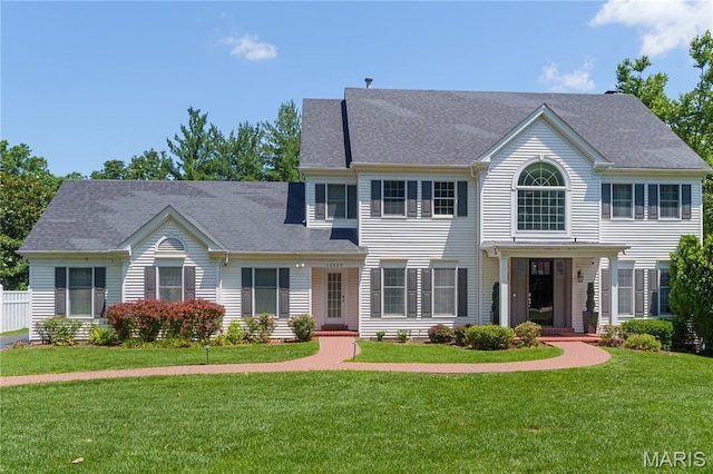 12429 Nicholas Ln, Saint Louis, MO 63131 - colonial house featuring a front yard