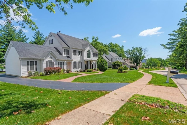 12429 Nicholas Ln, Saint Louis, MO 63131 - view of front of home featuring a front yard