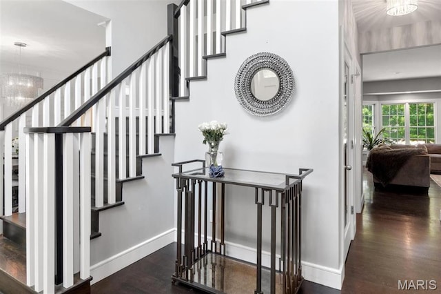 12429 Nicholas Ln, Saint Louis, MO 63131 - stairs featuring wood finished floors and a chandelier