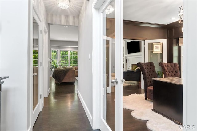 12429 Nicholas Ln, Saint Louis, MO 63131 - hall featuring french doors and dark wood-type flooring