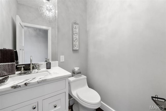 12429 Nicholas Ln, Saint Louis, MO 63131 - half bathroom with vanity and toilet