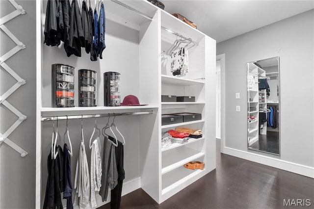 12429 Nicholas Ln, Saint Louis, MO 63131 - walk in closet with wood finished floors