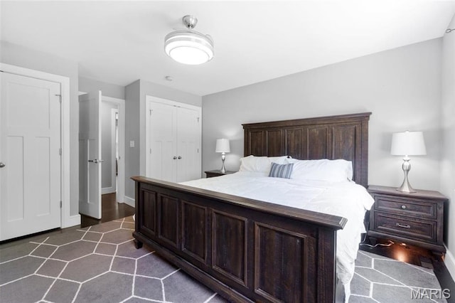 12429 Nicholas Ln, Saint Louis, MO 63131 - bedroom featuring baseboards and a closet