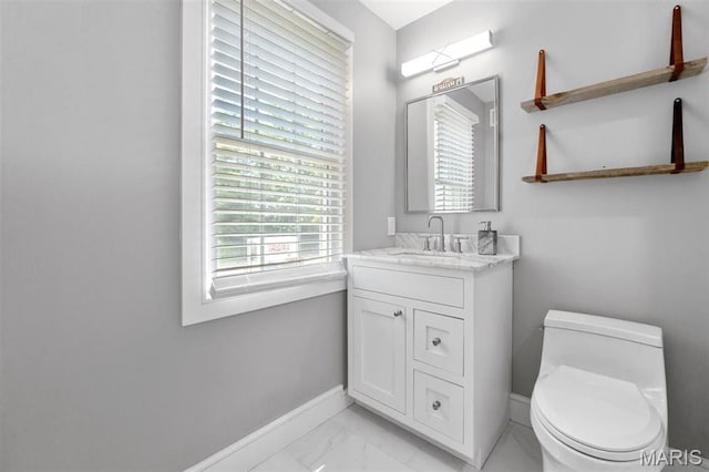 12429 Nicholas Ln, Saint Louis, MO 63131 - half bathroom with vanity and marble finish flooring