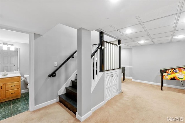 12429 Nicholas Ln, Saint Louis, MO 63131 - staircase featuring carpet flooring and recessed lighting