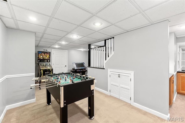 12429 Nicholas Ln, Saint Louis, MO 63131 - game room with recessed lighting, light colored carpet, and a paneled ceiling