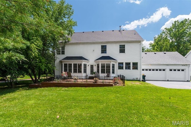 12429 Nicholas Ln, Saint Louis, MO 63131 - back of house with concrete driveway, a lawn, and a garage